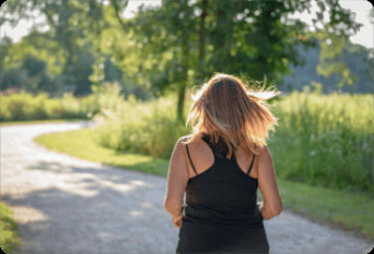 woman-running-on-path-in-morning